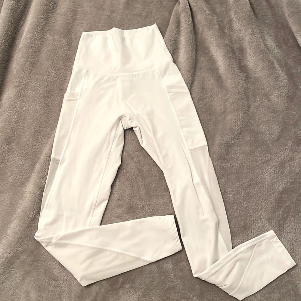 White leggings with mesh on the side from Aries